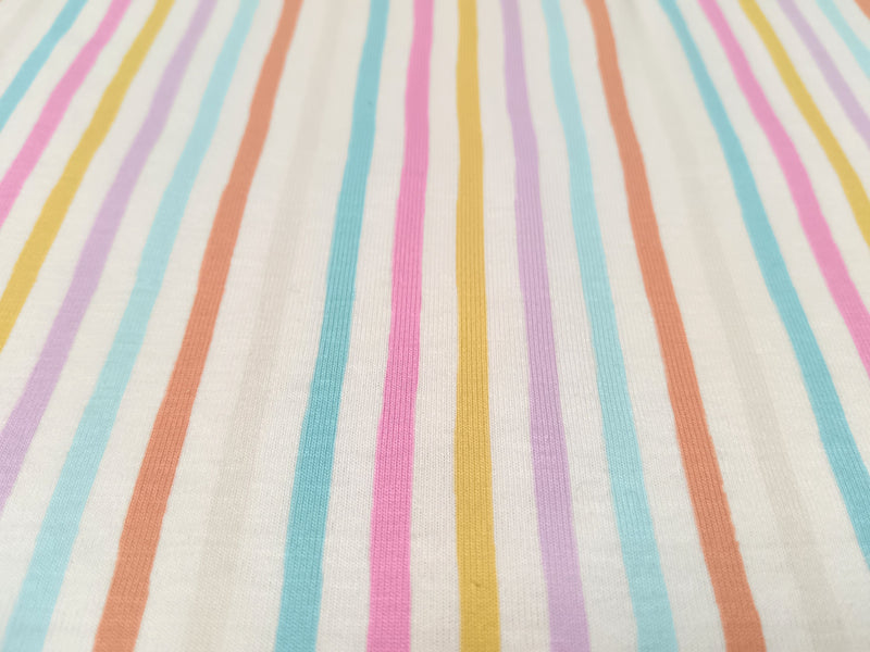 Baumwoll Jersey in ecru mit bunten patellfarbenen Streifen - Modemeter Stoffmarkt Trier   modemeter.de