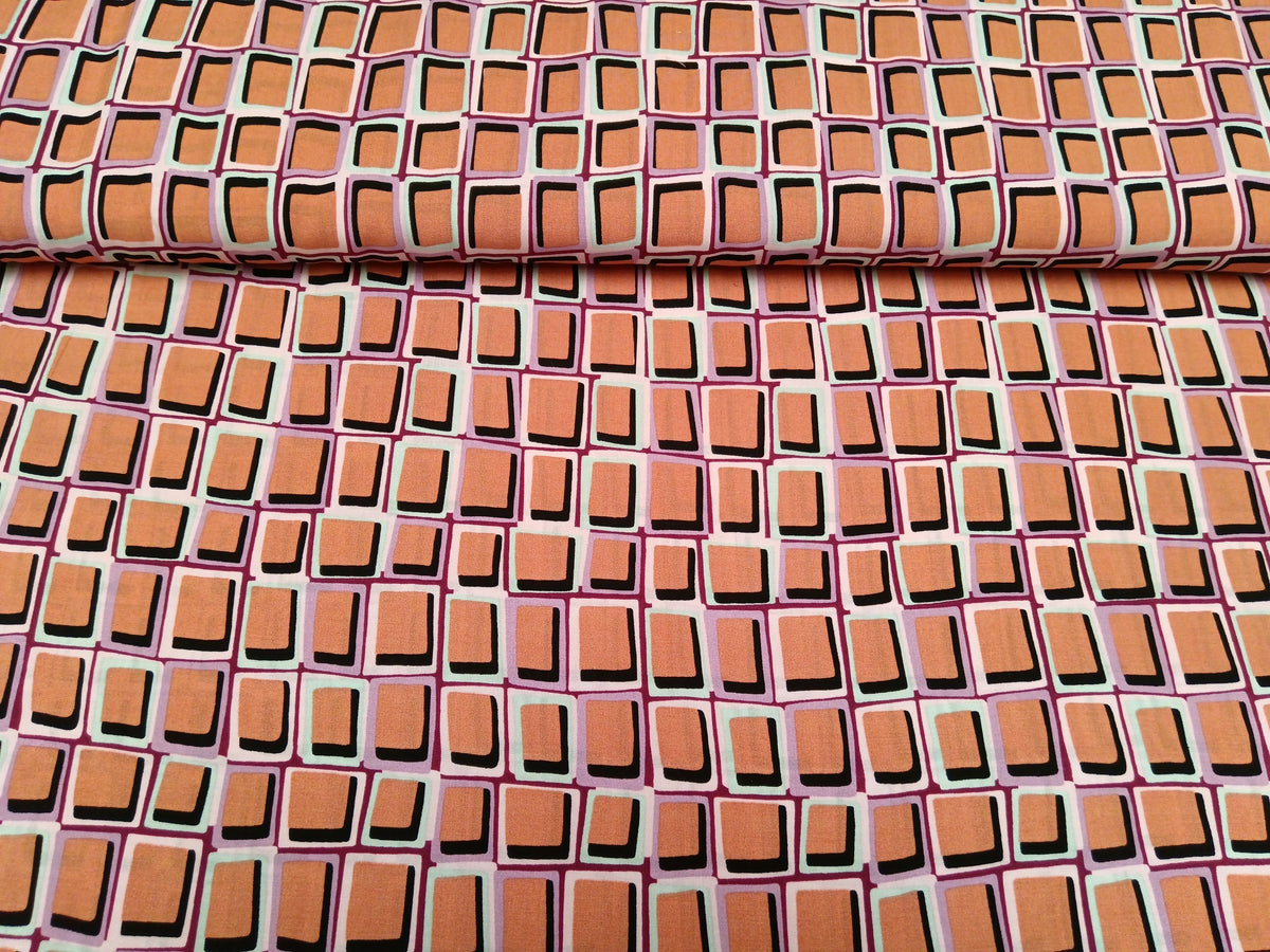 Fließender Sommerstoff aus Viskose im Retrostil und 3D in orange, flieder und weiß - Modemeter Stoffmarkt