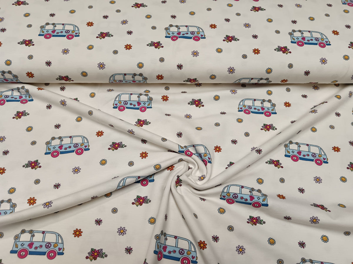 Flower Power - Kinderjersey im 70er Retro Look in weiß mit kleinen Blümchen und Bussen - Modemeter Stoffmarkt