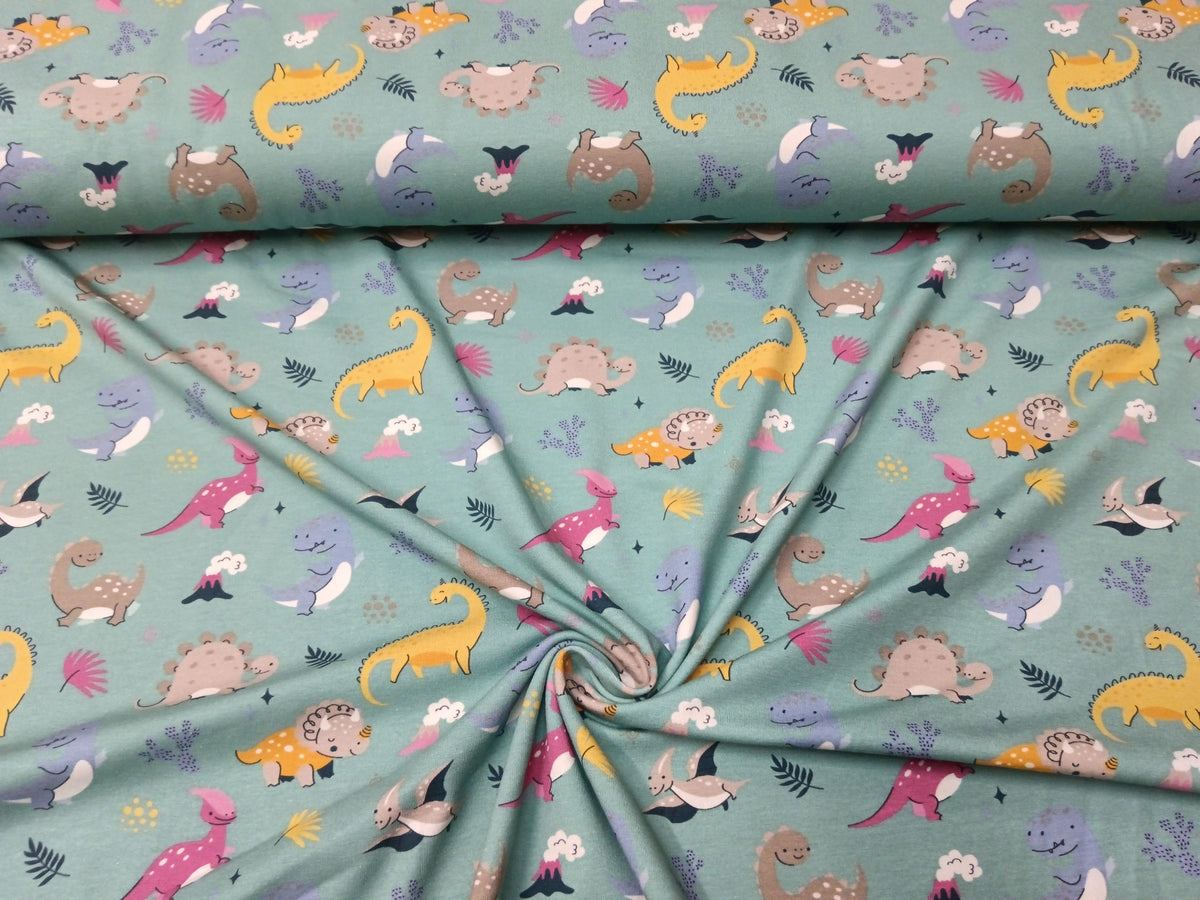 So niedlich - Baumwoll Jersey für Kinder in seegrün mit bunten Dinos - Modemeter Stoffmarkt