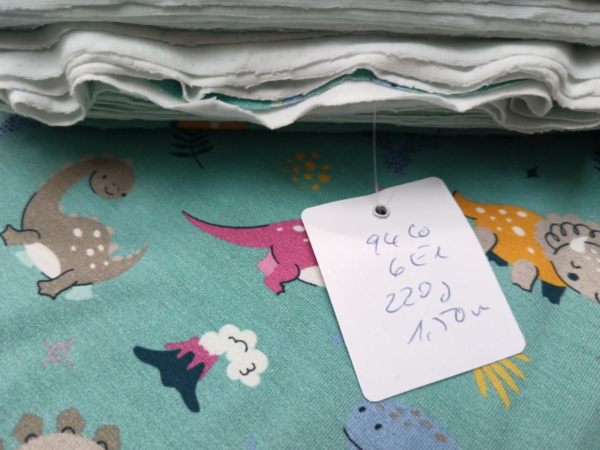 So niedlich - Baumwoll Jersey für Kinder in seegrün mit bunten Dinos - Modemeter Stoffmarkt