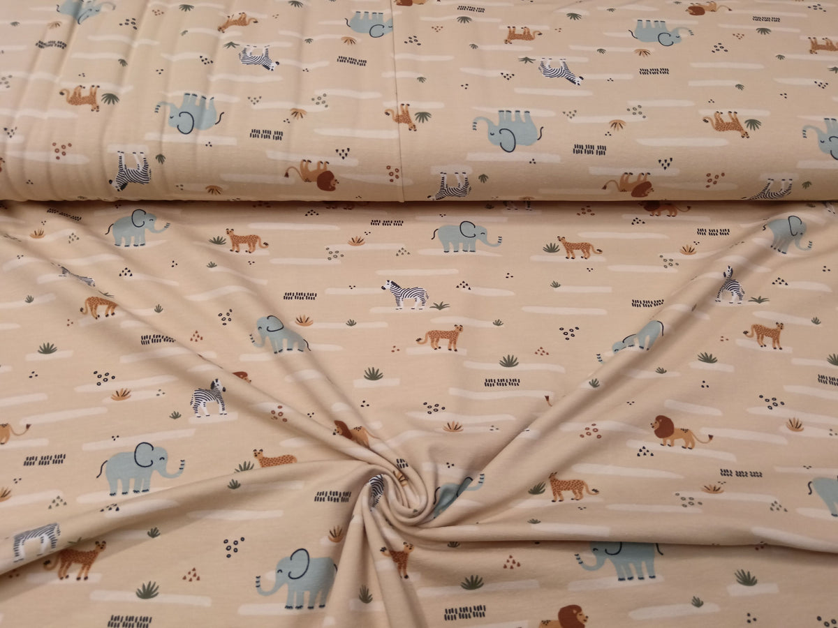 Niedlicher Baumwoll Jersey für Kinder in beige mit Zootieren - Modemeter Stoffmarkt
