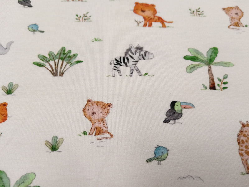 Niedlicher Kinderjersey aus Bio Baumwolle in ecru mit Zootieren - Modemeter Stoffmarkt