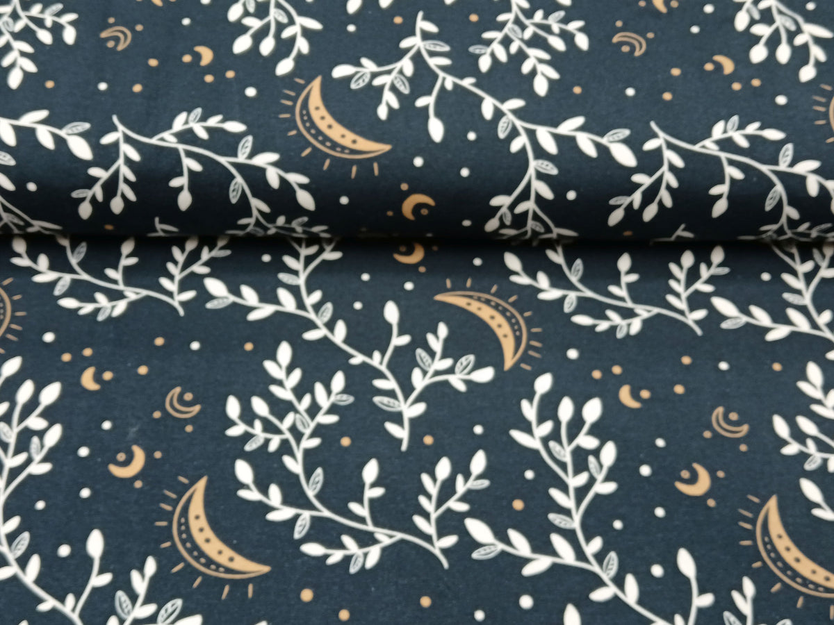 Modischer Baumwoll Jersey in dunkelblau mit Zweigen und goldenen Monden - Modemeter Stoffmarkt
