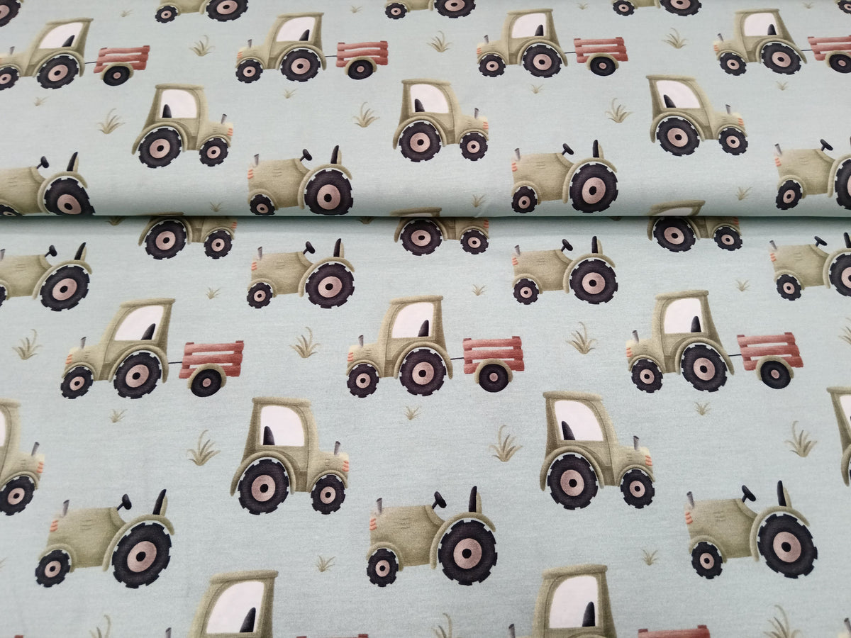Bauernhof Jersey in hellblau mit verschiedenen Traktoren - Modemeter Stoffmarkt