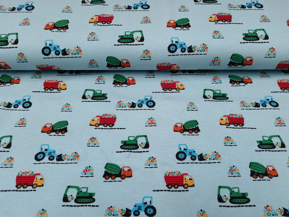 Baumwolljersey in hellblau mit Baggern, Traktoren, Lkw's - Modemeter Stoffmarkt