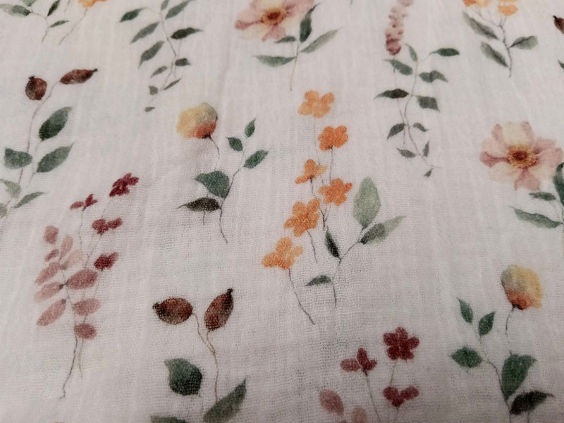 Sommerlich leichter Musselin (Double Gauze) in weiß mit pastelligen Blüten - Modemeter Stoffmarkt