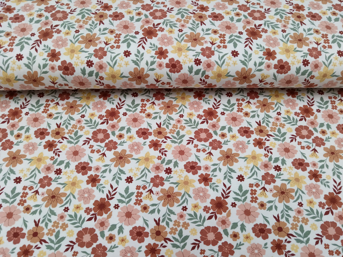 Floraler Baumwolljersey in ecru mit bunten, pastellfarbenen Blüten - Modemeter Stoffmarkt