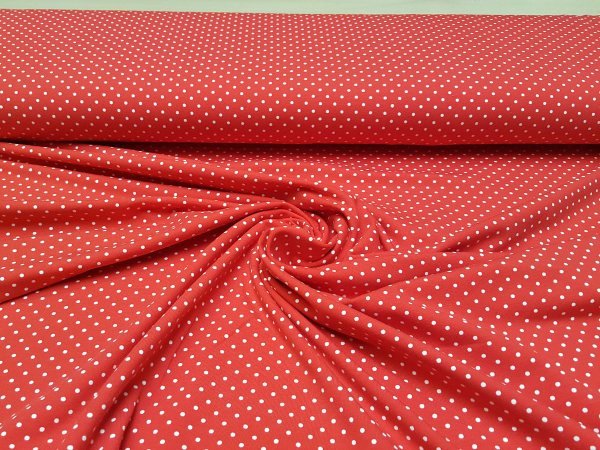 Klassischer Baumwoll Jersey in knallrot mit kleinen weißen Tupfen - Modemeter Stoffmarkt Trier   modemeter.de