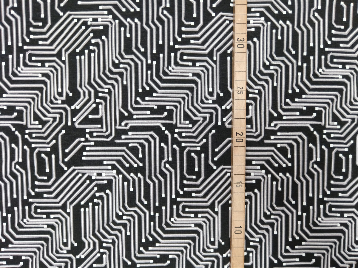 Besonderer Baumwolljersey mit grafischen Linien im Leiterplatten Design in schwarz weiß - Modemeter Stoffmarkt