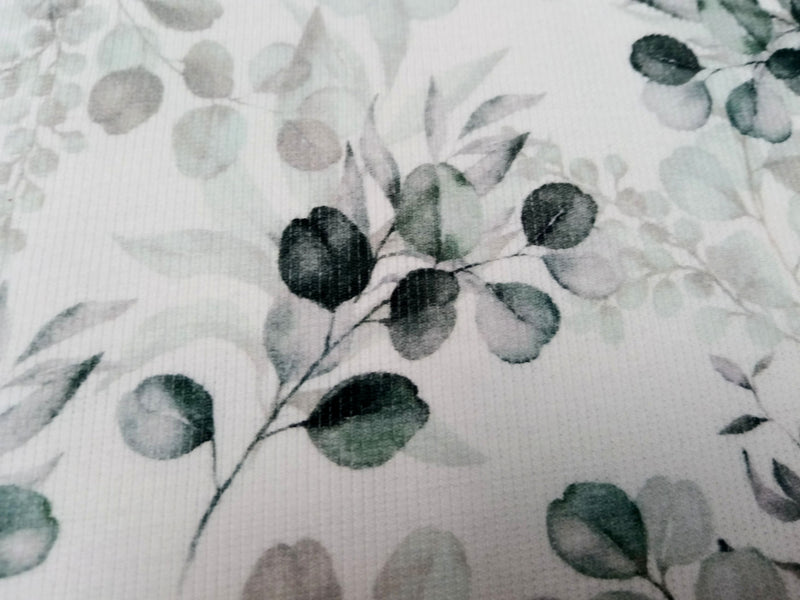 Besonderer Ripp Jersey in weiß mit grün-blauem Eucalyptus Design - Modemeter Stoffmarkt