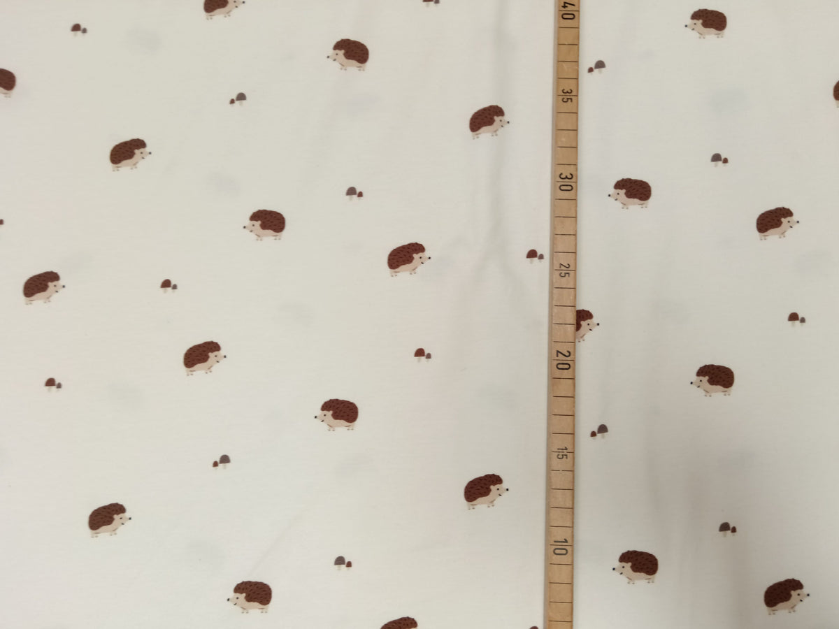 Niedlicher Baumwolljersey in ecru mit kleinen Igeln - Modemeter Stoffmarkt