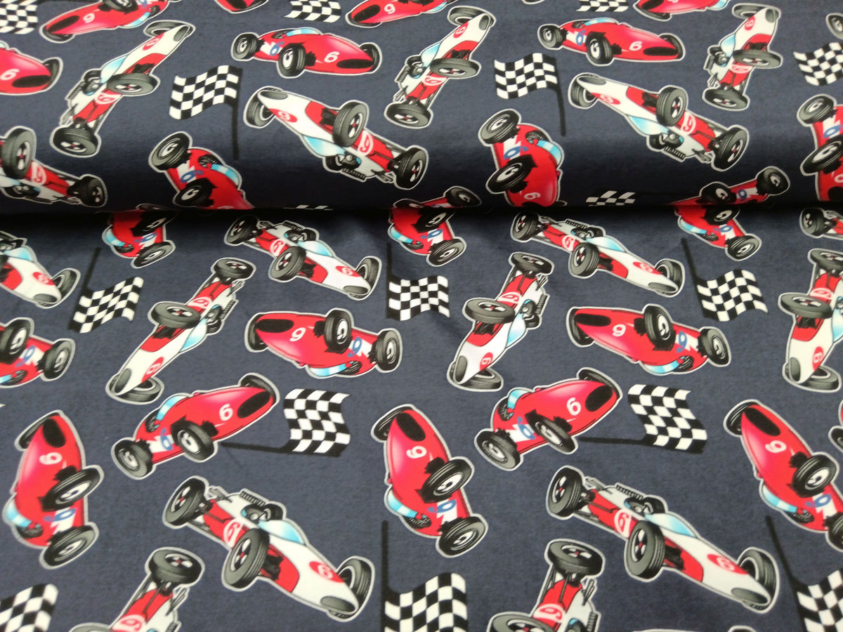Baumwolljersey in dunkelblau mit Rennwagen Motiven - digital bedruckt