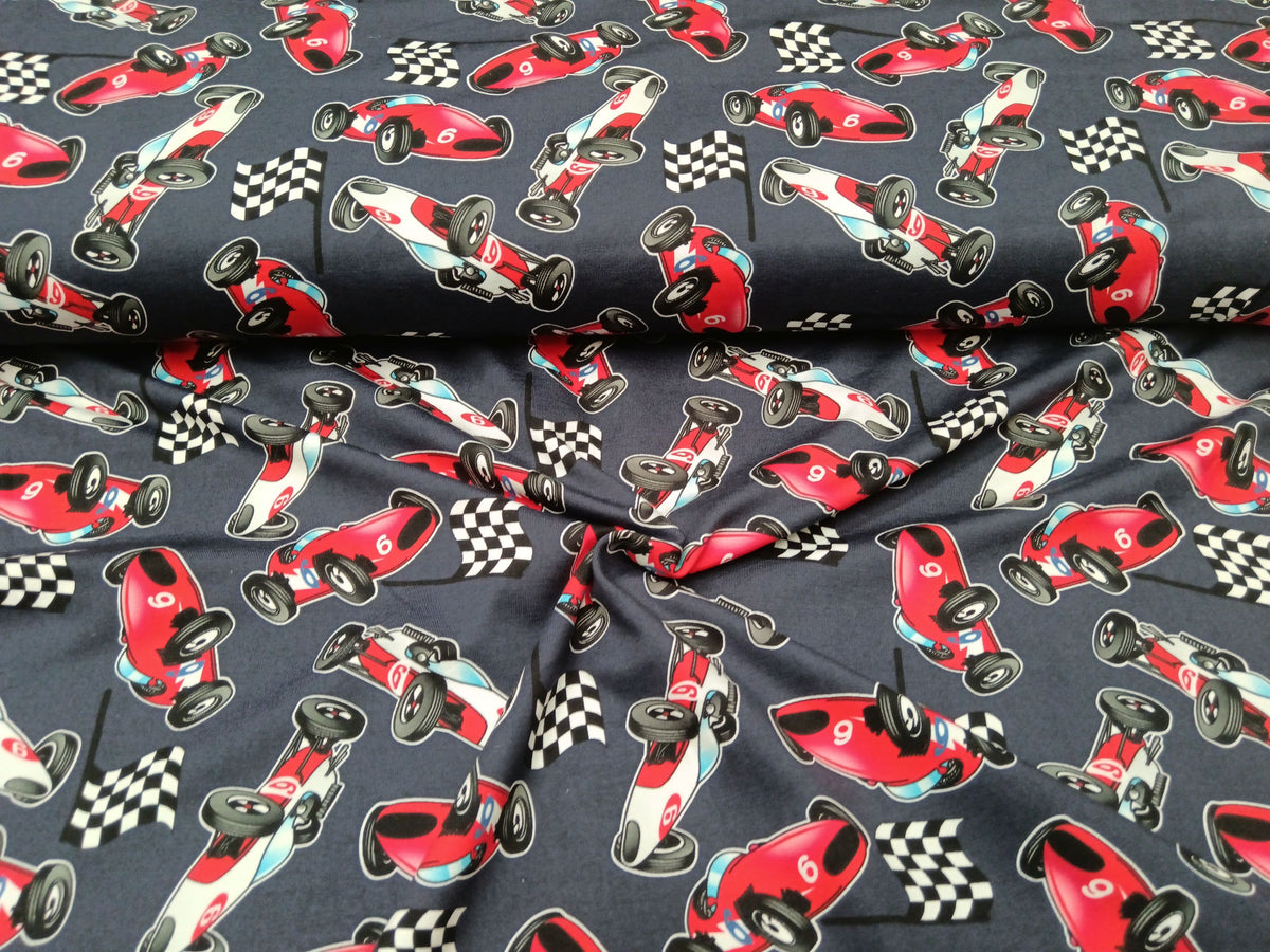 Baumwolljersey in dunkelblau mit Rennwagen Motiven - digital bedruckt