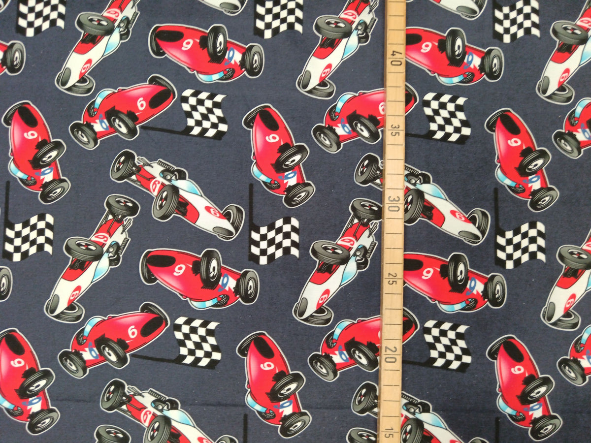 Baumwolljersey in dunkelblau mit Rennwagen Motiven - digital bedruckt