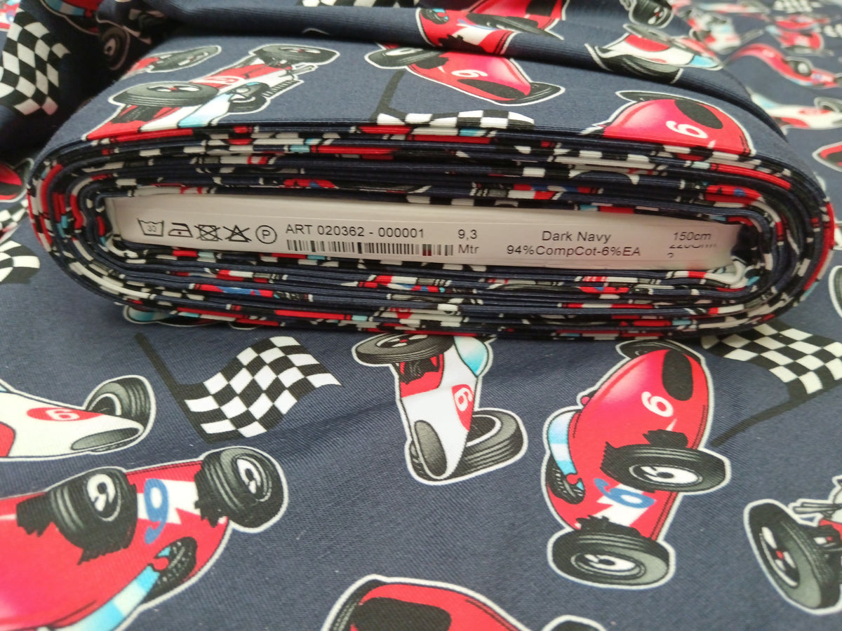 Baumwolljersey in dunkelblau mit Rennwagen Motiven - digital bedruckt