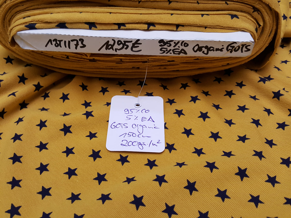 Organischer Baumwoll Jersey GOTS in senfgelb mit dunkelblauen Sternen - Modemeter Stoffmarkt Trier   modemeter.de