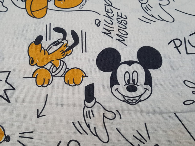 Disney Baumwollstoff in weiß, schwarz und senf mit Mickey Mouse und Pluto - Modemeter Stoffmarkt Trier   modemeter.de