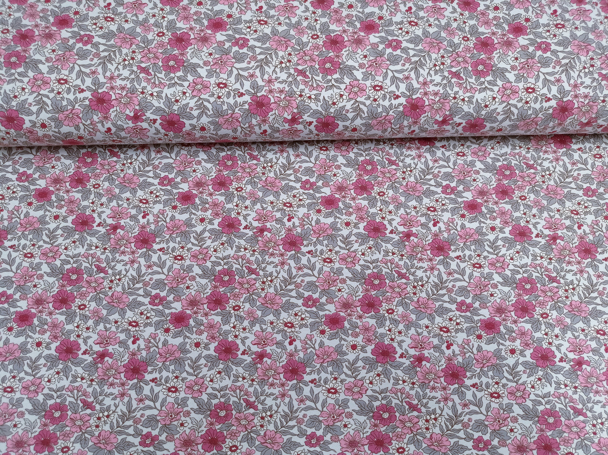 Baumwoll Jersey in ecru mit rosa und pinkfarbenen Blüten - Modemeter Stoffmarkt Trier   modemeter.de